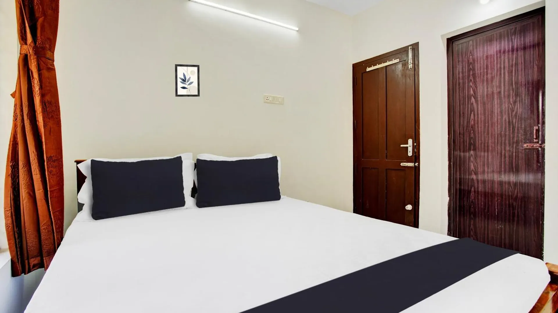 Hotel O Trivi Homestay Kovalam