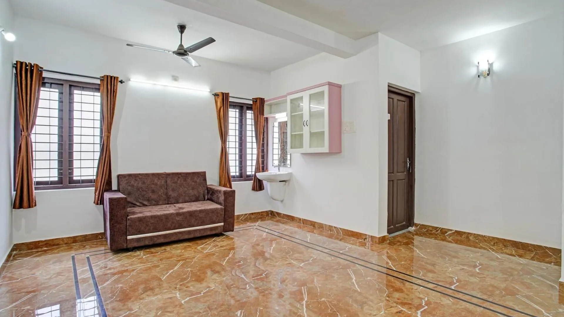 Hotel O Trivi Homestay كوفالام