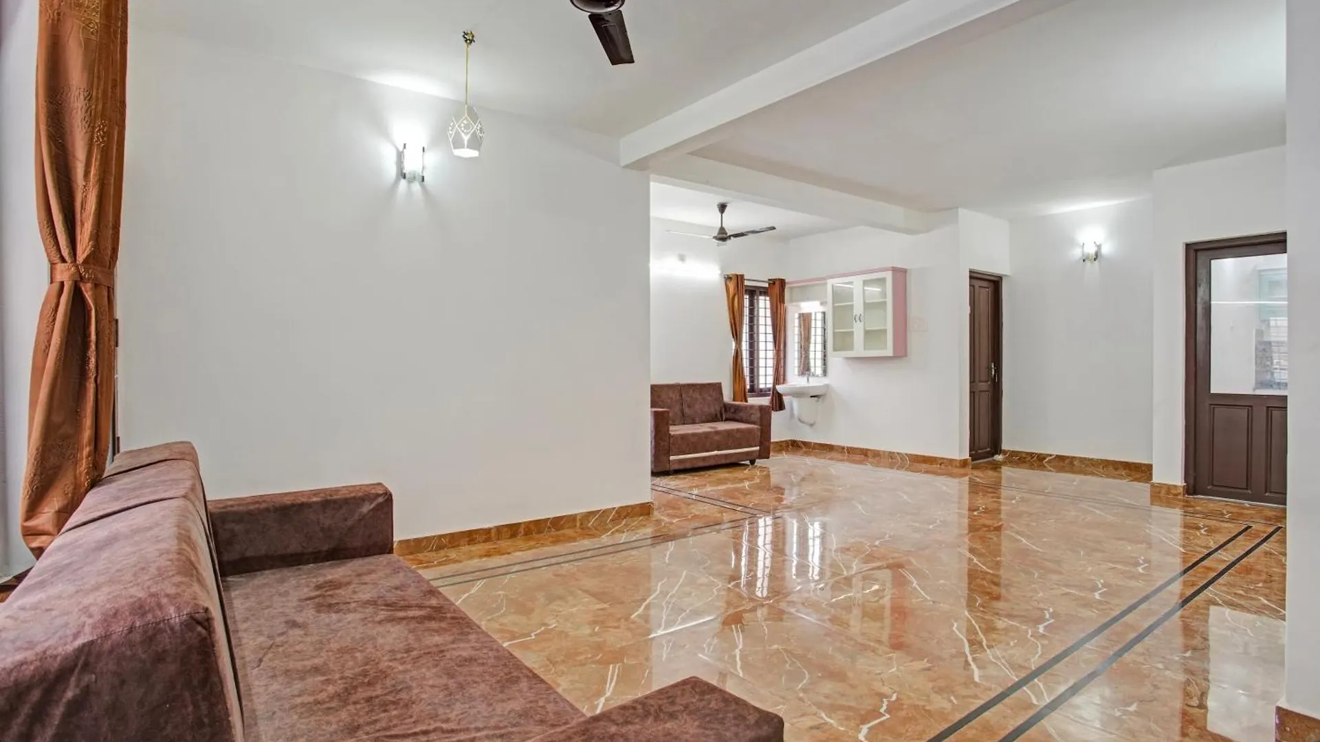 Hotel O Trivi Homestay كوفالام